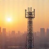 5G tower in the city landscape.